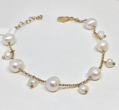 Pulseira dourada com pérolas de água doce na internet