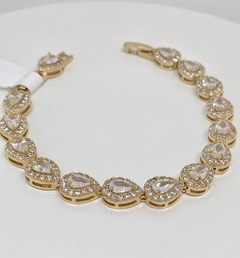 Pulseira dourada gotas zircônias cristais cravejadas em volta fecho joia - comprar online