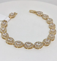Pulseira dourada gotas zircônias cristais cravejadas em volta fecho joia - comprar online