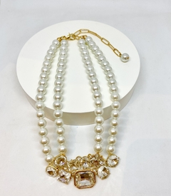 Colar dourado duplo pérolas shell com chatons no meio na internet