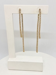 Brinco dourado fio zirconia frontal e outro que sai da tarraxa