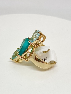Anel dourado cristais naturais azul claro e verde na internet