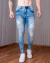 Calça Jeans Masculina Destroyed Rasgada Modelage Skinny -T400 na internet