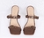 Mule em couro salto alto bambu com fivelas