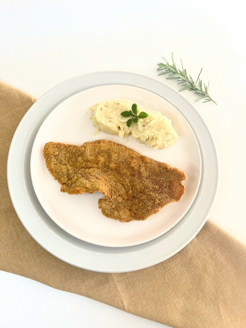 Milanesa de cerdo + puré de papas