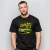 Homem vestindo camiseta preta com estampa do carro Ford Galaxie LTD 1976 em verde e amarelo, com texto World Cup 2026 e a taça da Copa do Mundo em destaque