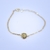 Pulseira com letra inicial banhada a ouro 18K na internet