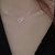 Colar Com 2 Pingente De Coração Vazado Acessório Feminino Prata. - paradisusstore