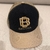 Boné Trucker Preto e Dourado