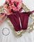 Calcinha fio duplo na cor bordô com regulagem e detalhes em coração. Frozen Intimates.