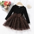 Vestido na cor preta com mangas longas e estampas de leopardo - comprar online