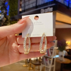 Brincos curvos em gota - comprar online