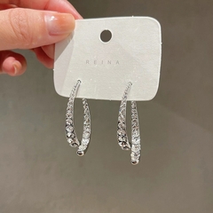 Brincos curvos em gota - loja online