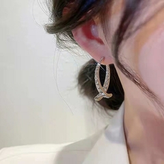 Brincos curvos em gota