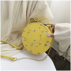 Bolsa transversal redonda de couro sintético - comprar online
