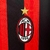 Camisa Milan 24/25: Elegância em vermelho e preto com design exclusivo! Mostre sua paixão pelo Rossonero. Garanta já o seu manto!