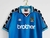 Se você é apaixonado pelo Manchester City e curte um estilo clássico, a camisa Retrô do City é a peça que faltava no seu guarda-roupa! Com design inspirado nas grandes conquistas do clube, ela traz todo o legado dos Citizens de uma forma única e elegante.