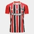 Camisa São Paulo Away 25/26 com listras verticais vermelhas, pretas e brancas, mangas vermelhas e logo do SPFC no peito