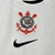 Camisa do Corinthians Home 25/26 nas cores branco e preto com logo do clube e símbolo da Nike