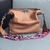 BOLSA VALENTINO GUITAR ROCKSTUD ROLLING HOBO na internet