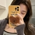 Estojo para celular com suporte de urso amarelo leitoso na internet