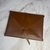 Case couro sintético para caderno Caramelo