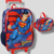 KIT MOCHILA COM RODINHAS + LANCHEIRA SUPERMAN (IC39222SM-AZ)
