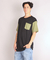 Remera Over Negra con Manga y Bolsillo Verde - comprar online