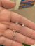 PIERCING TRAGUS HAMSA