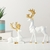Conjunto de 2 Renas Douradas Decorativas na internet