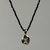 COLAR BANHADO A OURO ESPINÉLIO NEGRO PINGENTE OVAL COM CRAVAÇÃO DE ZIRCÔNIA RETANGULAR - comprar online