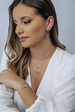 Brinco Orgânico Cravejado Dourado na internet