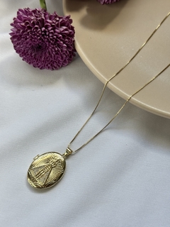 Relicário Nossa Senhora Cravejado Dourado na internet