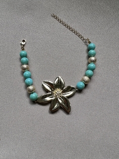 Pulseira Flor Dourado com Turquesa e Esferas na internet