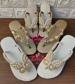 Slin glitter dourada com peça mar azul na internet