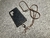 Funda/Soporte Samsung. 2 Terminales Espiral, 1 Pasador Espiral con Argolla y 1 Pendiente Fleur de Lys, Plata 925 & Crossbody, Marrón o Negro.- KC45S - comprar online