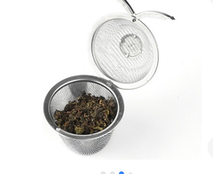 INFUSOR DE TÉ , con forma de canasta . Acero quirúrgico.