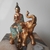 Buda Sidarta com Elefante - Ouro Velho - Resina - comprar online