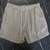 Short linho kingejoe curto areia