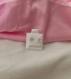 Broquel Oro Mariposa con ziriconia rosa