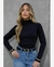 Blusa peluciada