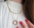 Corrente com Pingente Redondo e Escrita Banhada a Ouro 18K - comprar online