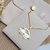 Colar Dois Meninos com Detalhes em Ródio e Banho Ouro 18k