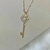 Corrente com Pingente de Chave Branco Banhada a Ouro 18k - comprar online