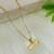 Colar com Pingente de Osso com Ponto de Luz Banhada a Ouro 18K