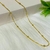 Colar com Detalhes de Bolinhas Lisa em Malha Rabo de Rato em Banho Ouro 18k