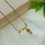 Colar "Dinda" e Menina Banhada a Ouro