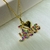 Colar "JESUS" Cravejado com Zircônias Coloridas - comprar online