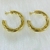 Argola Tubular Torcida Banhada a Ouro 18k - Dabru Joias