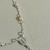 Pulseira Terço com Perolas e Pingente Cruz na internet